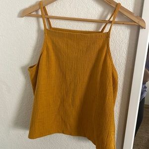 this is a one of a kind tank, it’s been worn a few times but feels brand new :)